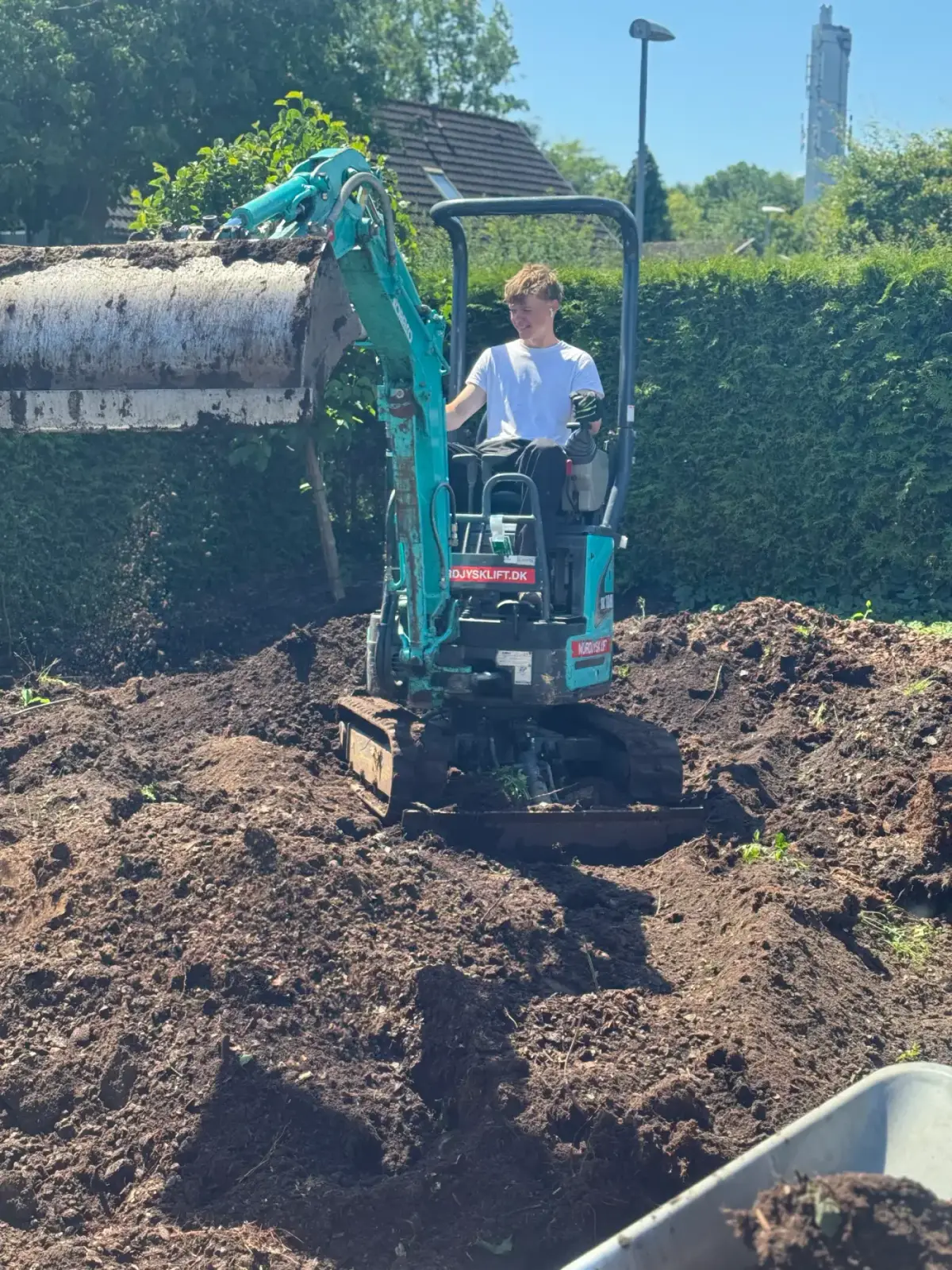 Minigraver på jordarbejde